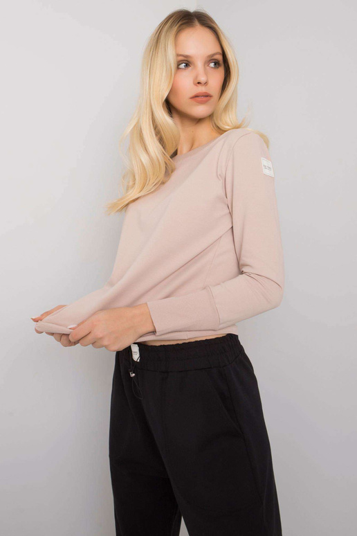 Must ja beež naiste vabaaja komplekt...