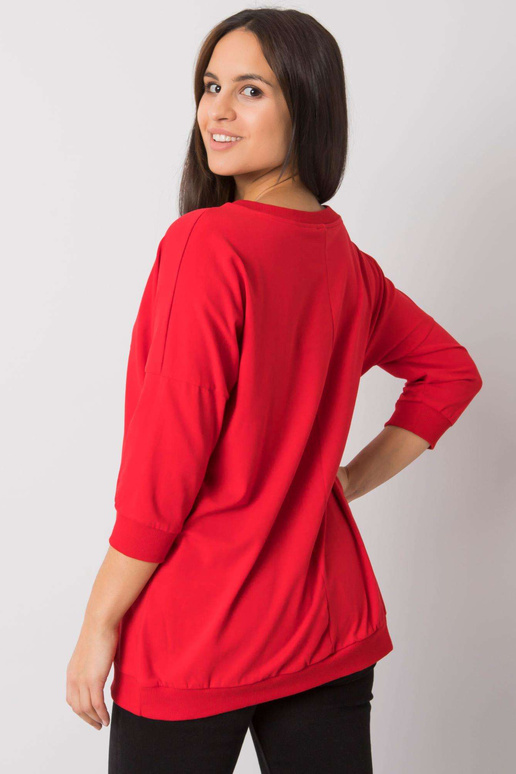 Punane dressipluus kirjaga Jolanda...