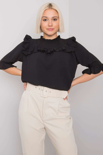 Must volangidega pluus...