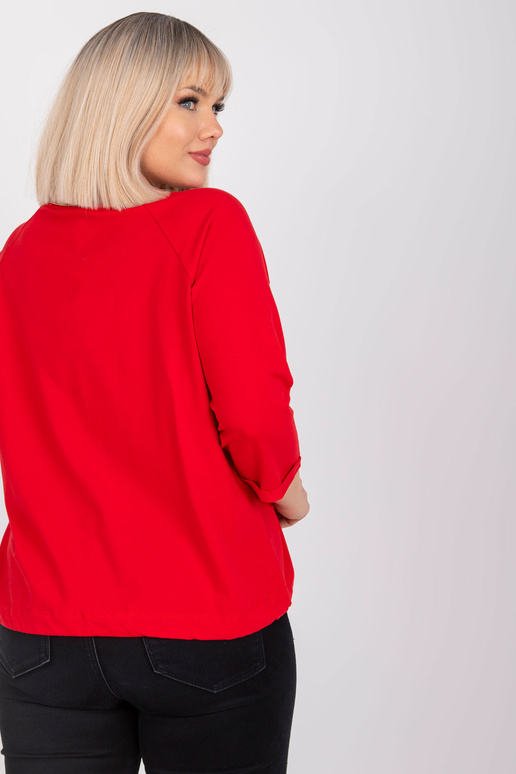 Punane pluss suuruses pluus...