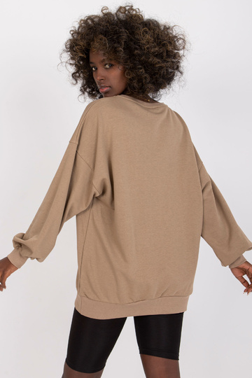 Tumebeež naiste kapuutsita... 2