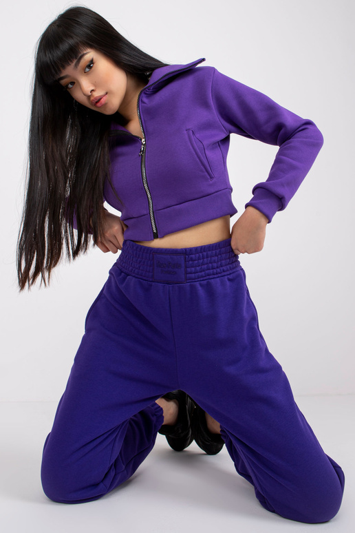 Tumelillad taskutega dressipüksid RUE...