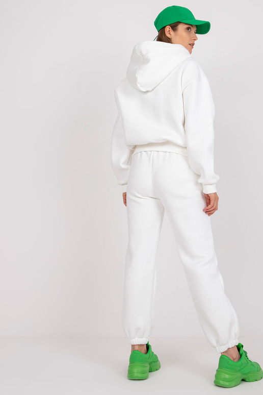 Valge põhiline taskutega dressipluusi...