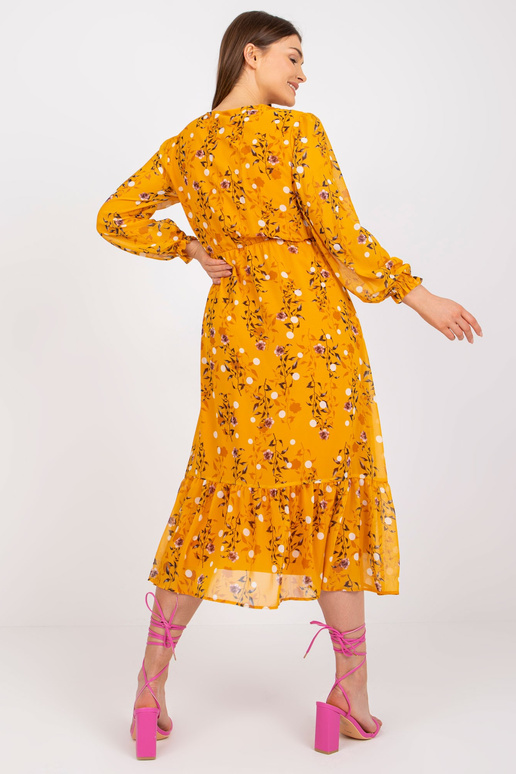 Tumekollane trükiste ja volangidega... Tumekollane trükiste ja volangidega...