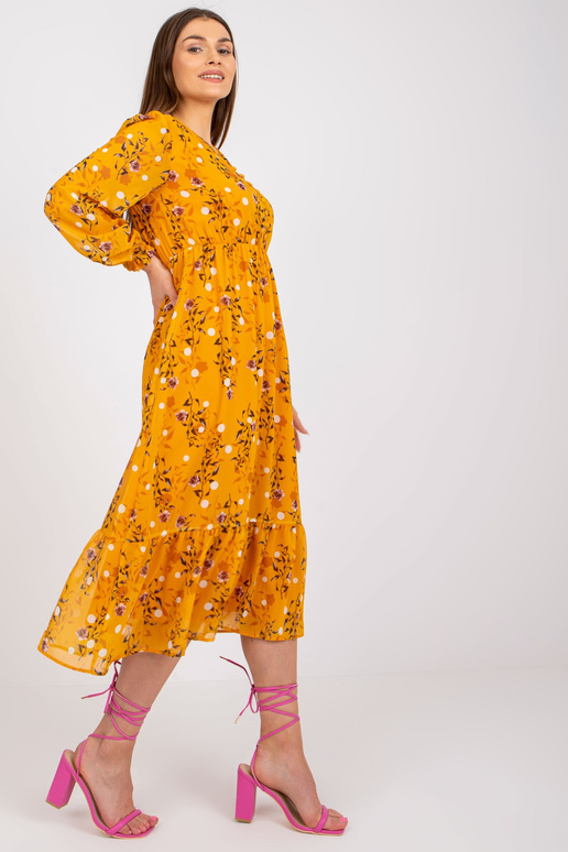 Tumekollane trükiste ja volangidega... Tumekollane trükiste ja volangidega...