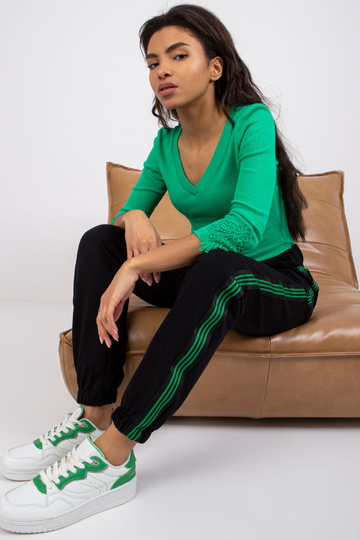 Rohelise triibuline pluus...