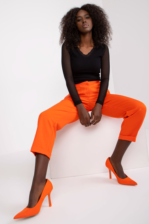 Oranžid püksid sirge säärega kangast...