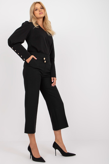 Mustast kangast püksid 7/8... 2