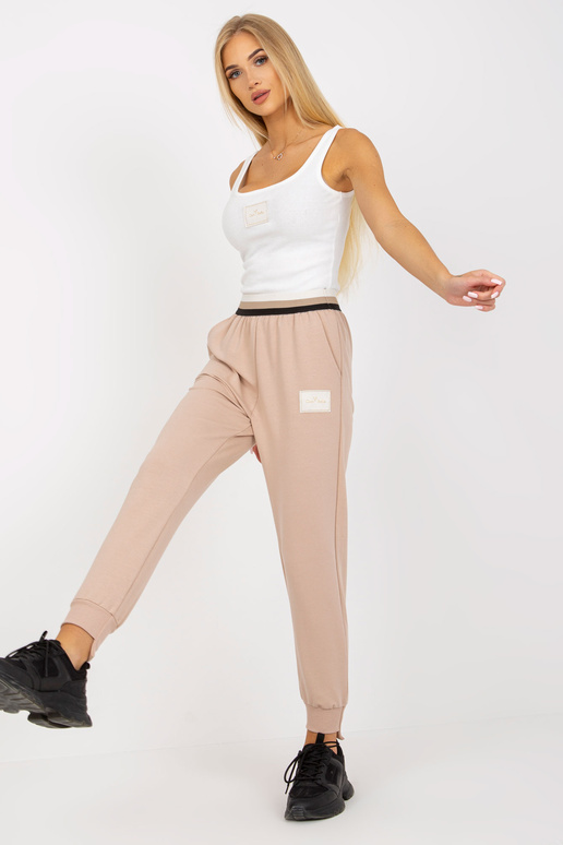 Beežid kõrge vöökohaga dressipüksid...