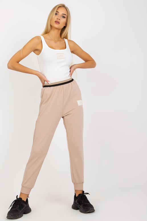 Beežid kõrge vöökohaga dressipüksid...