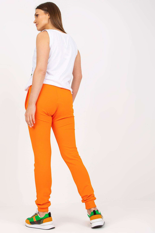 Valge ja oranž kaheosaline ülaosaga...