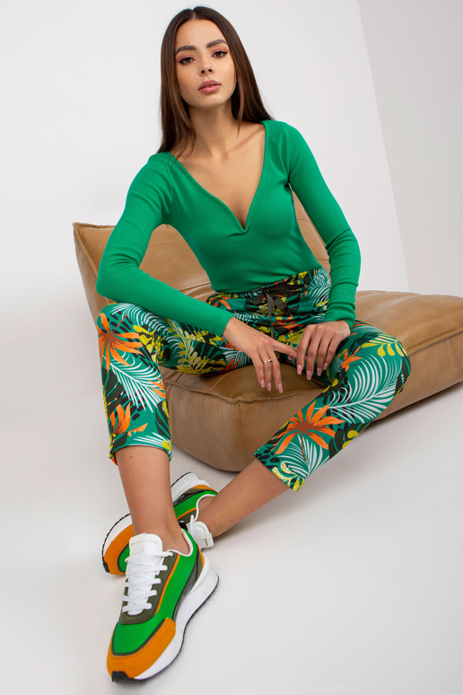 Rohelise mustriga taskutega dressipüksid