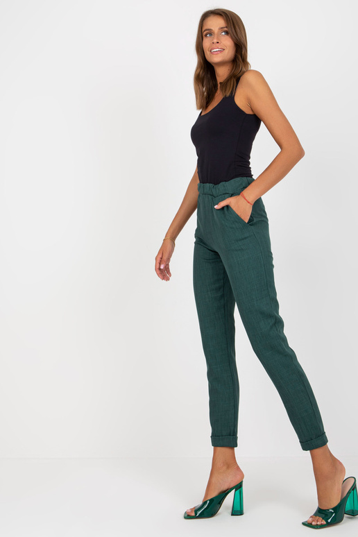 Tumerohelised elegantsed riidest püksid