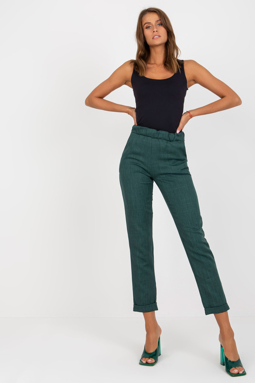 Tumerohelised elegantsed riidest püksid