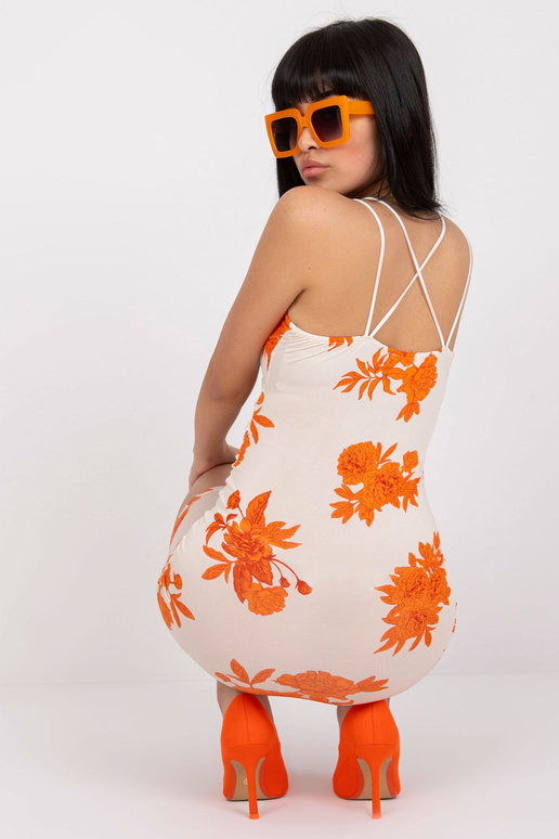 Lilletrükiga beež ja oranž ühe...