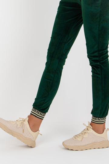 Dunkelgrünes zweiteiliges Veloursset mit Hose