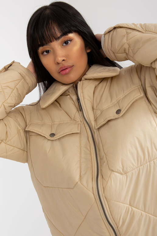 Helebeež tepitud taskutega üleminekujakk Helebeež tepitud taskutega üleminekujakk