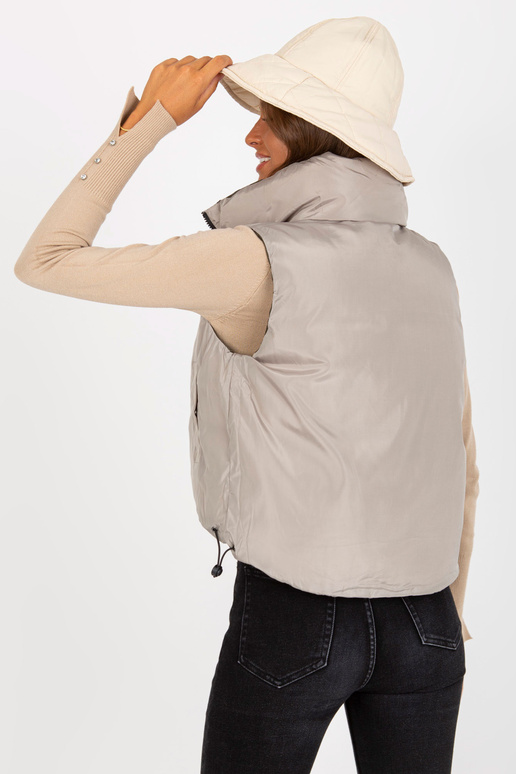 Khaki värvi kahepoolne sulevest ilma... Khaki värvi kahepoolne sulevest ilma...