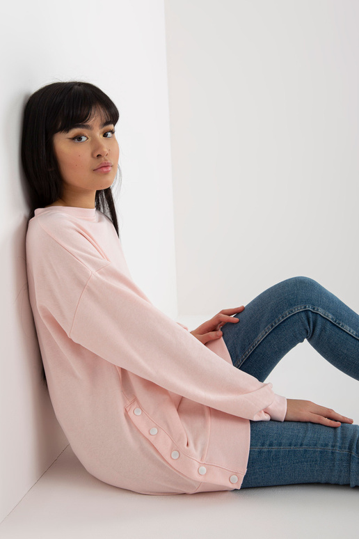 Heleroosa kapuutsita nööpnõeltega...