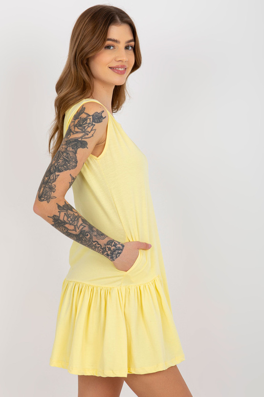 Kollane mini, põletatud volangidega...