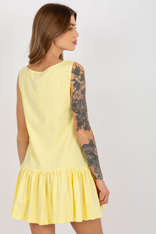 Kollane mini, põletatud volangidega...