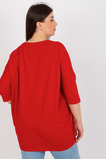 Punane pluss suuruses pluus...