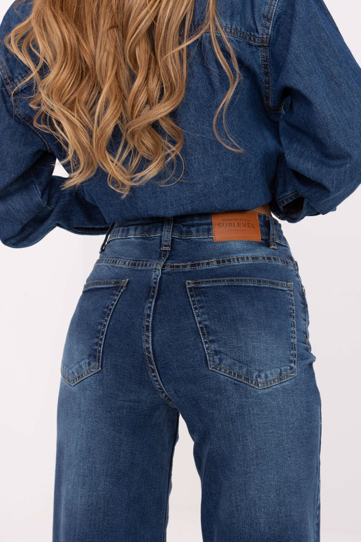 Tumedalt sinised püksid