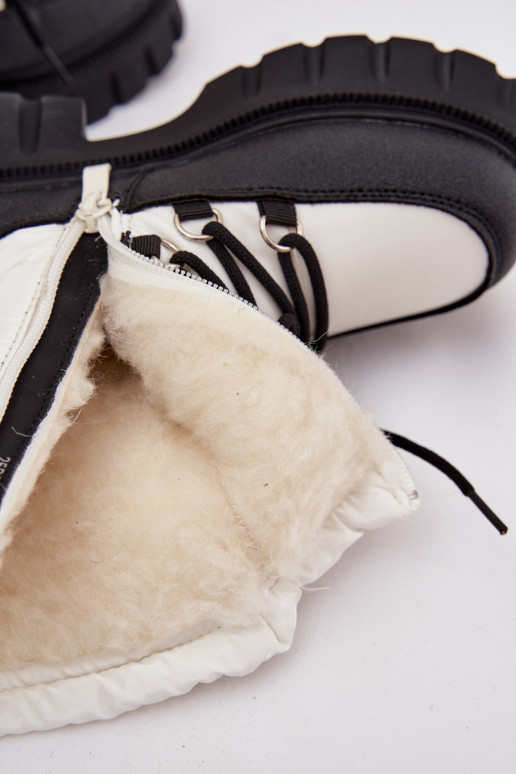 Nööpidega lumesaapad valget värvi Adelisse