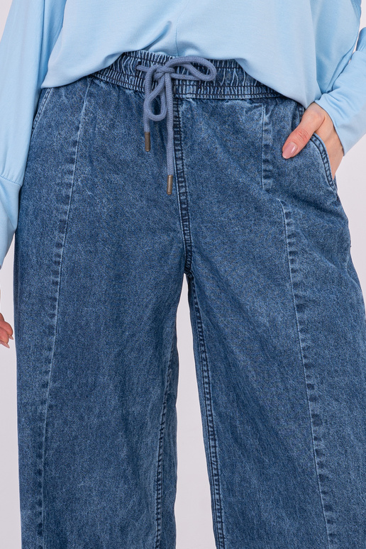 Tume sinised püksid