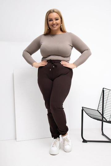 Tumespruunid spordipüksid