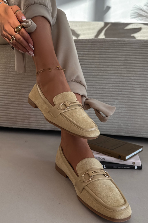 Naistelised mokasiinid kaunistatud elementidega kollases Evelora