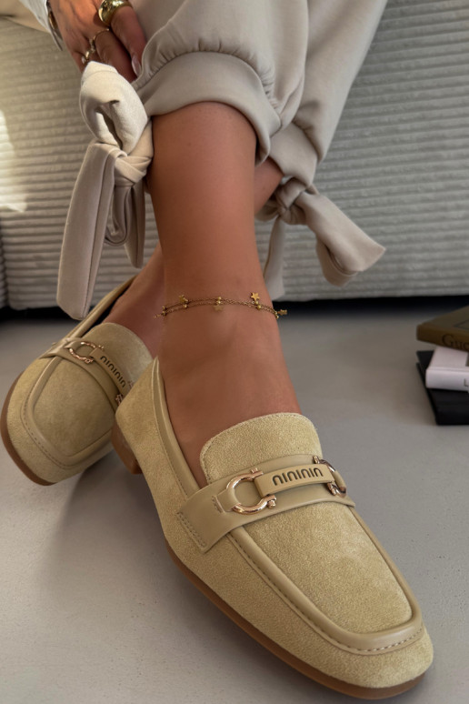 Naistelised mokasiinid kaunistatud elementidega kollases Evelora