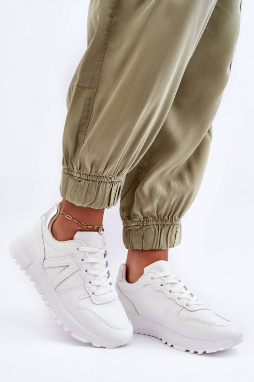    spordijalatsid valget värvi Kabama