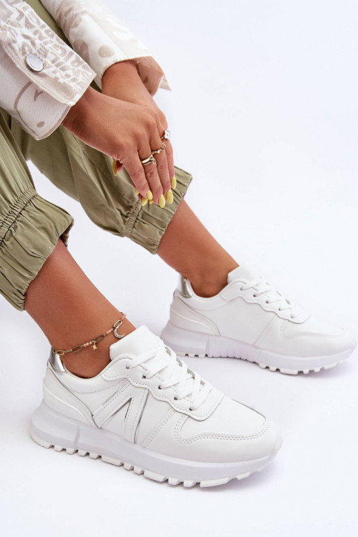    spordijalatsid valget värvi Kabama