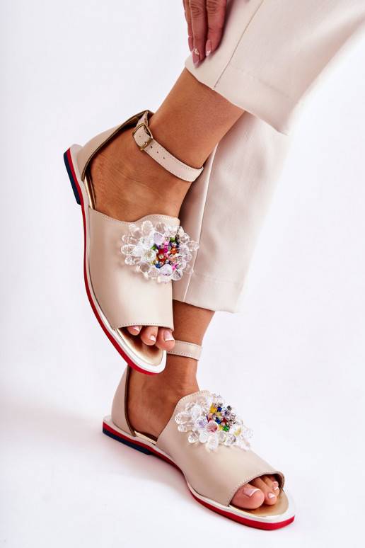 Sandaalid kaunistustega beeži värvi...