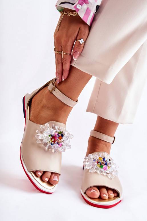 Sandaalid kaunistustega beeži värvi...