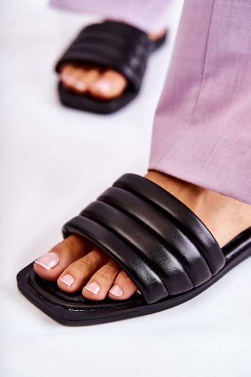 Plätud naturaalsest nahast mustad Raula